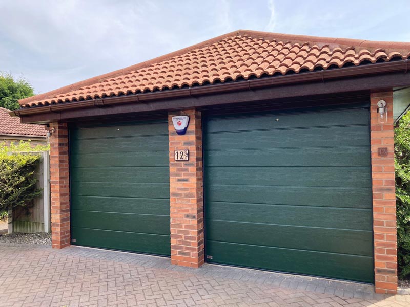 Embossed finish garage door